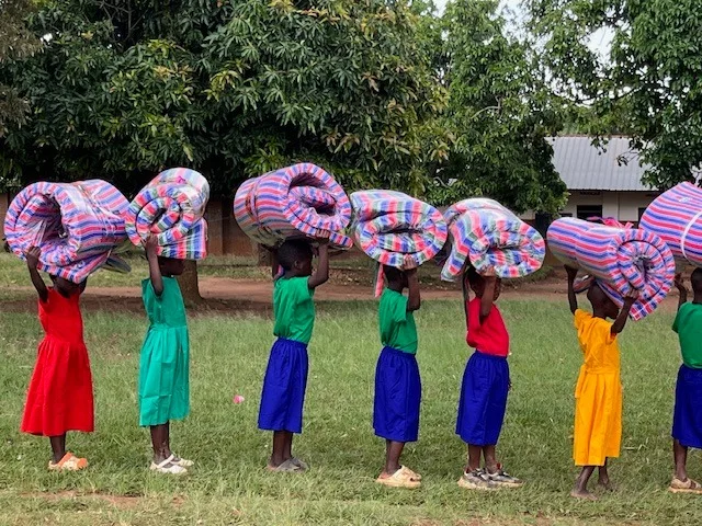 Children receiving bedkits